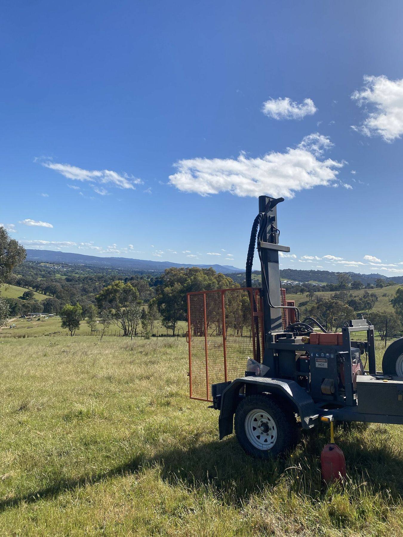 Environmental scientist assessing soil and land capability on a rural block in regional NSW